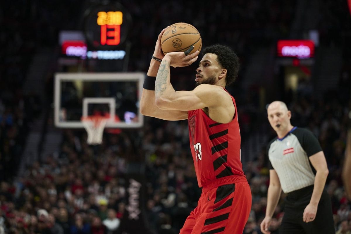 Jan 9, 2026; Portland, Oregon, USA; Portland Trail Blazers forward Toumani Camara (33) shoots a jump shot during the second half against Houston Rockets at Moda Center. Mandatory Credit: Troy Wayrynen-Imagn Images