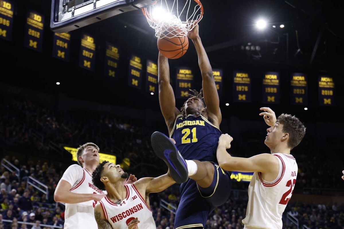 Jan 10, 2026; Ann Arbor, Michigan, USA;  Michigan Wolverines forward Morez Johnson Jr. (21) dunks in the first half against the Wisconsin Badgers at Crisler Center. Mandatory Credit: Rick Osentoski-Imagn Images