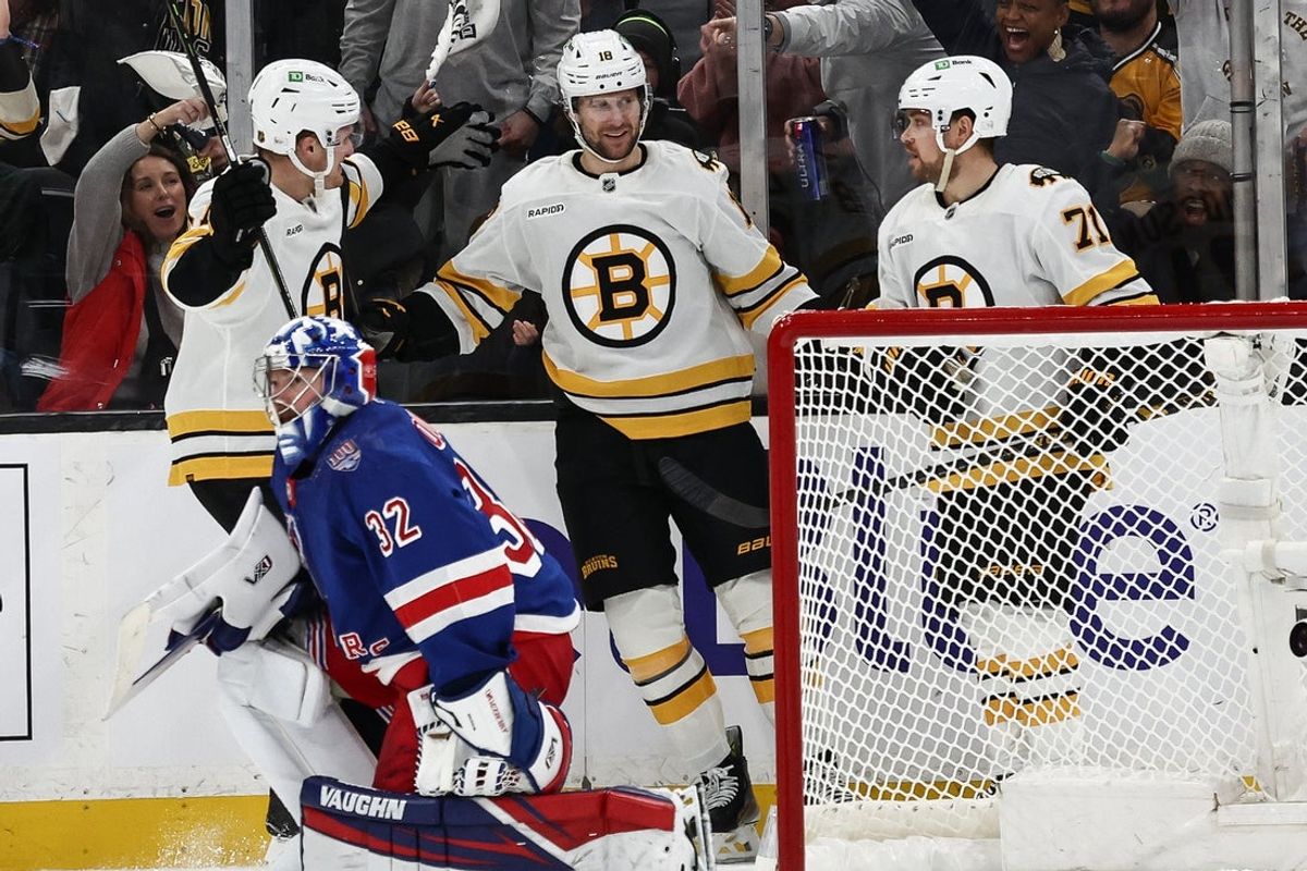 Jan 10, 2026; Boston, Massachusetts, USA; Boston Bruins center Pavel Zacha (18) is congratulated after scoring his third goal of the game during the second period against the New York Rangers at TD Garden. Mandatory Credit: Winslow Townson-Imagn Images
