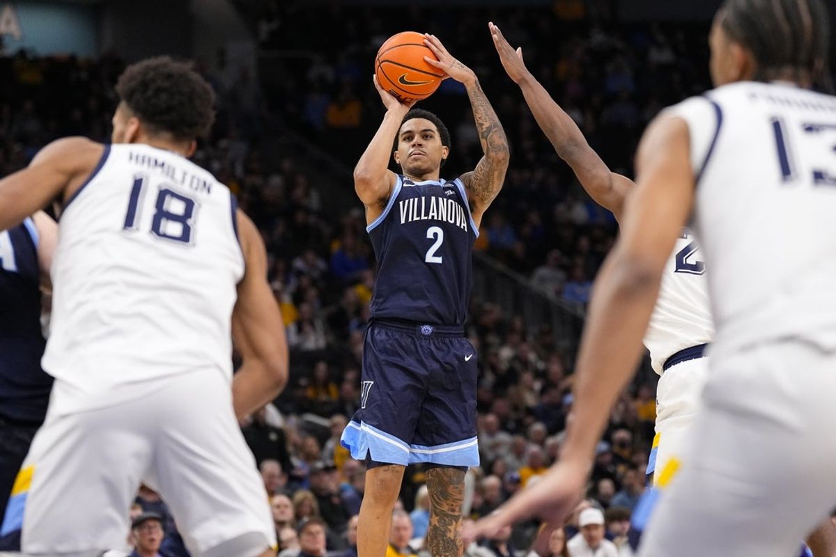 Jan 10, 2026; Milwaukee, Wisconsin, USA;  Villanova Wildcats guard Bryce Lindsay (2) shoots during the first half against the Marquette Golden Eagles at Fiserv Forum. Mandatory Credit: Jeff Hanisch-Imagn Images