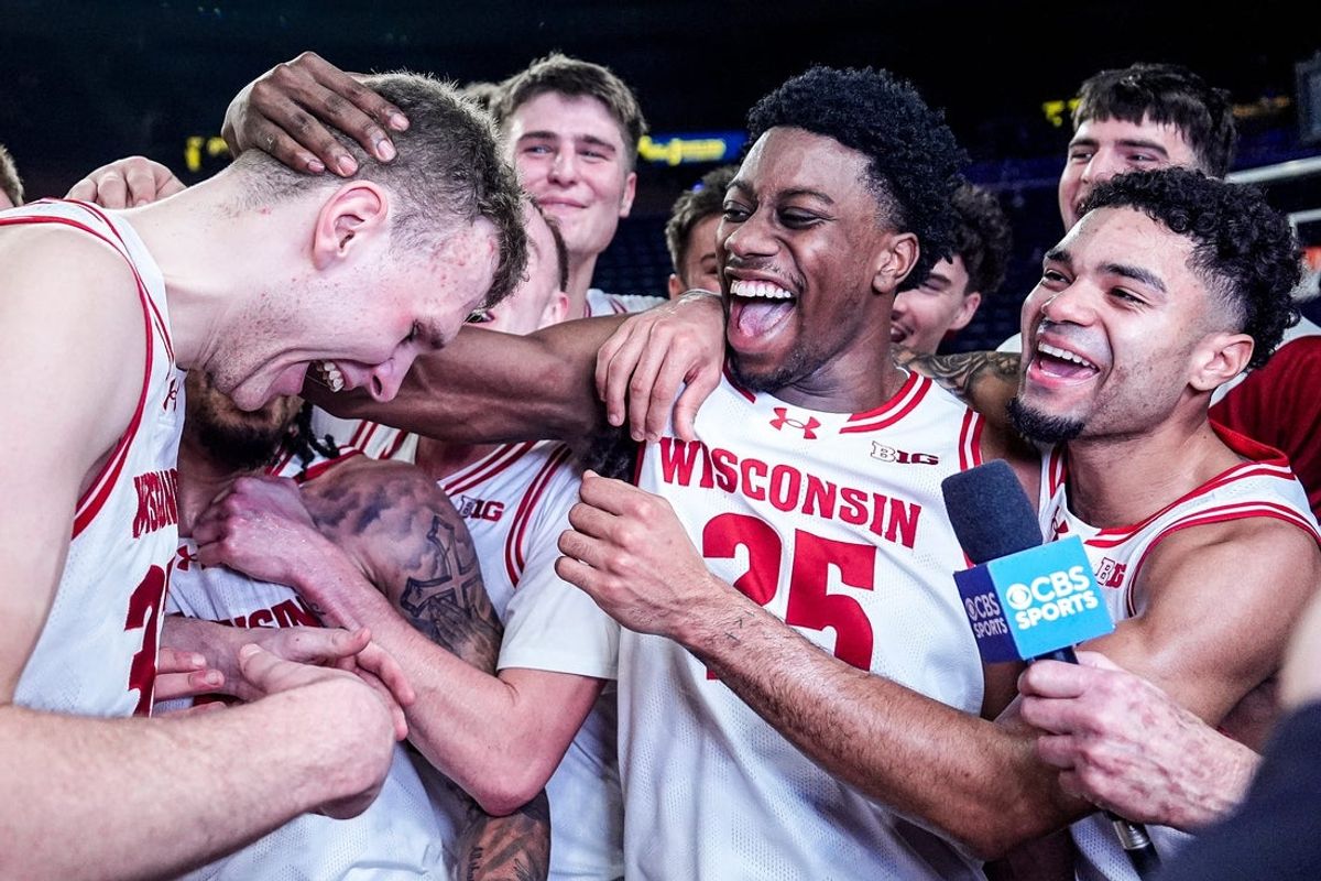 Wisconsin forward Aleksas Bieliauskas (32), left, and guard John Blackwell (25) celebrate 91-88 win over Michigan at Crisler Center in Ann Arbor on Saturday, Jan. 10, 2026.