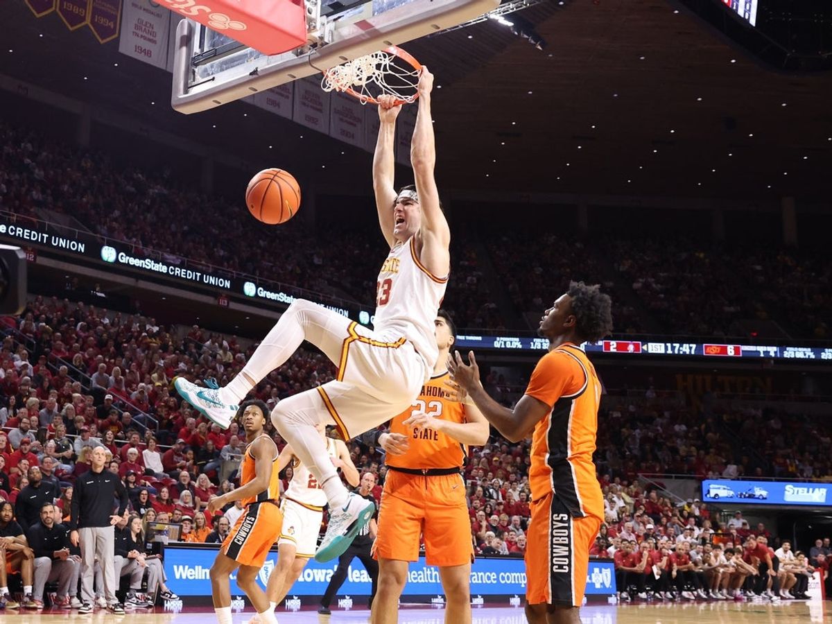 Jan 10, 2026; Ames, Iowa, USA; Iowa State Cyclones forward Blake Buchanan (23) dunks in their game with the Oklahoma State Cowboys during the first half at James H. Hilton Coliseum. Mandatory Credit: Reese Strickland-Imagn Images
