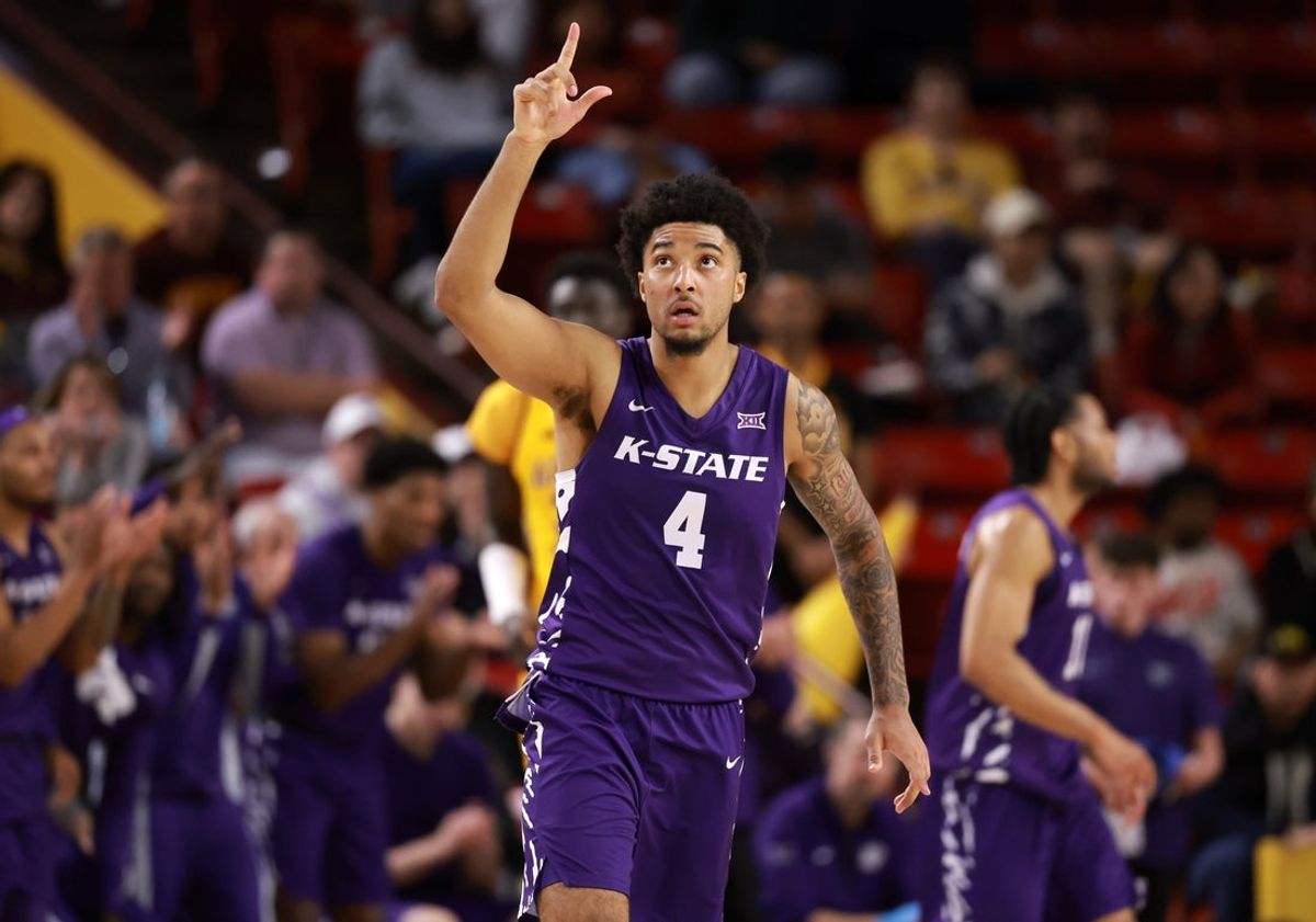 Jan 10, 2026; Tempe, Arizona, USA; Kansas State Wildcats guard P.J. Haggerty (4) celebrates a three point shot against the Arizona State Sun Devils in the second half at Desert Financial Arena. Mandatory Credit: Mark J. Rebilas-Imagn Images