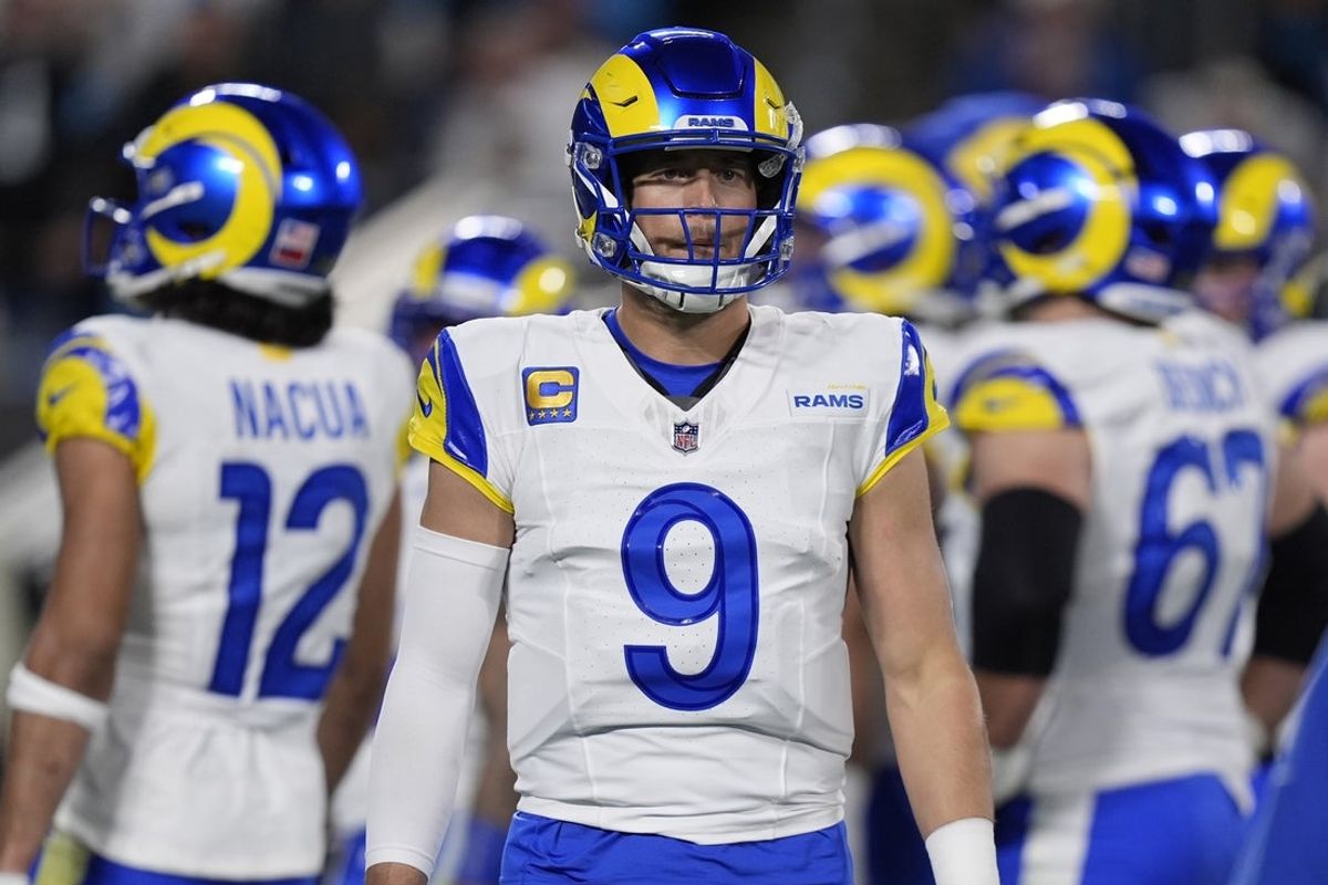 Jan 10, 2026; Charlotte, NC, USA; Los Angeles Rams quarterback Matthew Stafford (9) reacts in the first half during the NFC Wild Card Round game at Bank of America Stadium. Mandatory Credit: Jim Dedmon-Imagn Images
