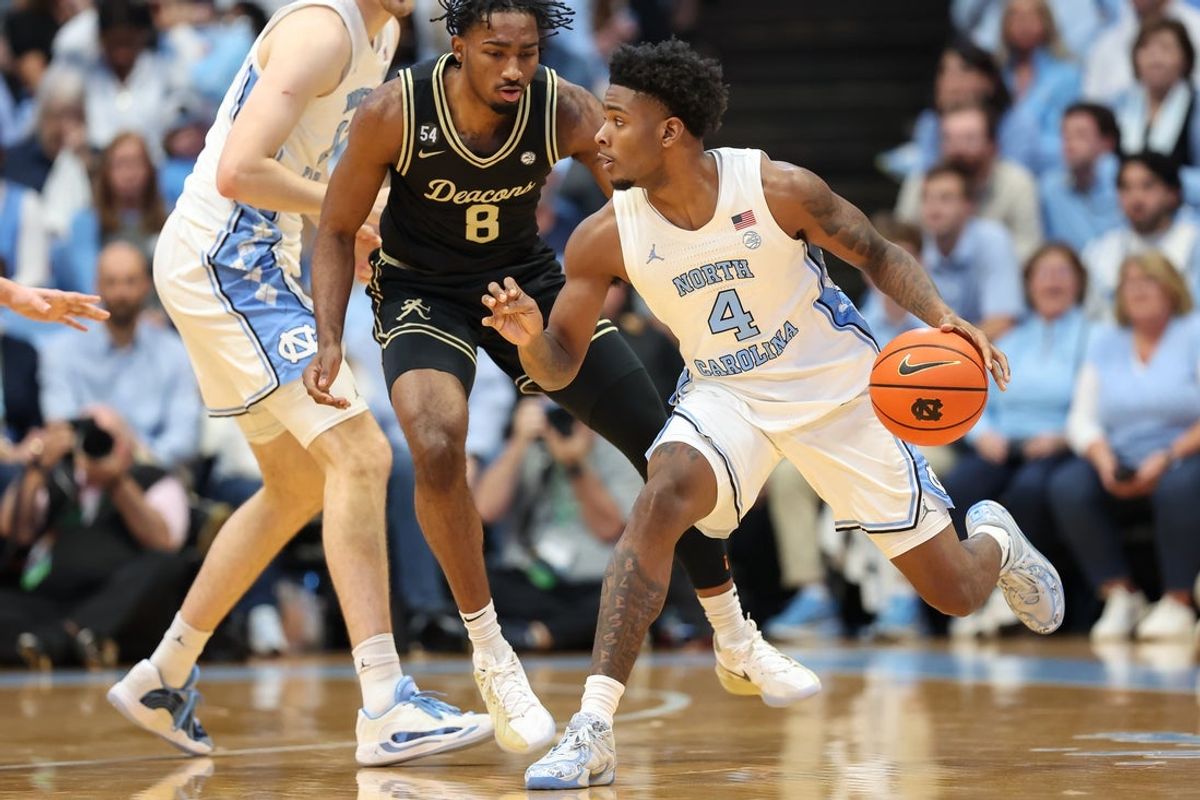 Jan 10, 2026; Chapel Hill, North Carolina, USA; North Carolina Tar Heels guard Jaydon Young (4) with the ball against the Wake Forest Demon Deacons during the first half at Dean E. Smith Center. Mandatory Credit: Cory Knowlton-Imagn Images