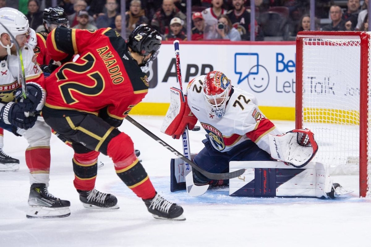Jan 10, 2026; Ottawa, Ontario, CAN; Florida Panthers goalie Sergei Bobrovsky (72) makes a save on a shot from Ottawa Senators right wing Michael Amadio (22) in the first period at the Canadian Tire Centre. Mandatory Credit: Marc DesRosiers-IMAGN Images