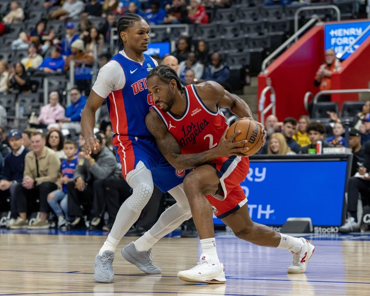 Jan 10, 2026; Detroit, Michigan, USA; Detroit Pistons forward Ausar Thompson (9) defends against LA Clippers forward Kawhi Leonard (2) during the first quarter at Little Caesars Arena. Mandatory Credit: David Reginek-Imagn Images