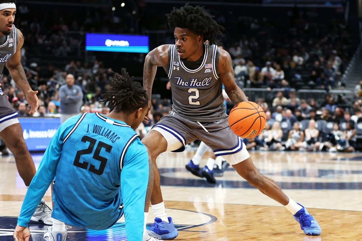 Jan 10, 2026; Washington, District of Columbia, USA; Seton Hall Pirates guard Tajuan Simpkins (2) slips past Georgetown Hoyas guard Jeremiah Williams (25) during the second half at Capital One Arena. Mandatory Credit: Daniel Kucin Jr.-Imagn Images