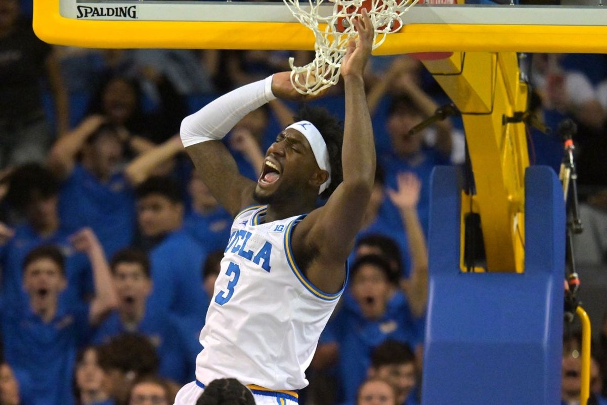 Jan 10, 2026; Los Angeles, California, USA;  UCLA Bruins forward Eric Dailey Jr. (3) reacts after a dunk in the first half against the Maryland Terrapins at Pauley Pavilion presented by Wescom Financial. Mandatory Credit: Jayne Kamin-Oncea-Imagn Images