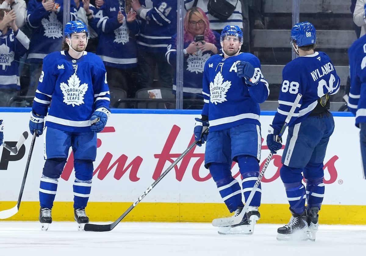 Jan 10, 2026; Toronto, Ontario, CAN; Toronto Maple Leafs center John Tavares (91) scores a goal and celebrates with right wing William Nylander (88) against the Vancouver Canucks during the second period at Scotiabank Arena. Mandatory Credit: Nick Turchiaro-Imagn Images