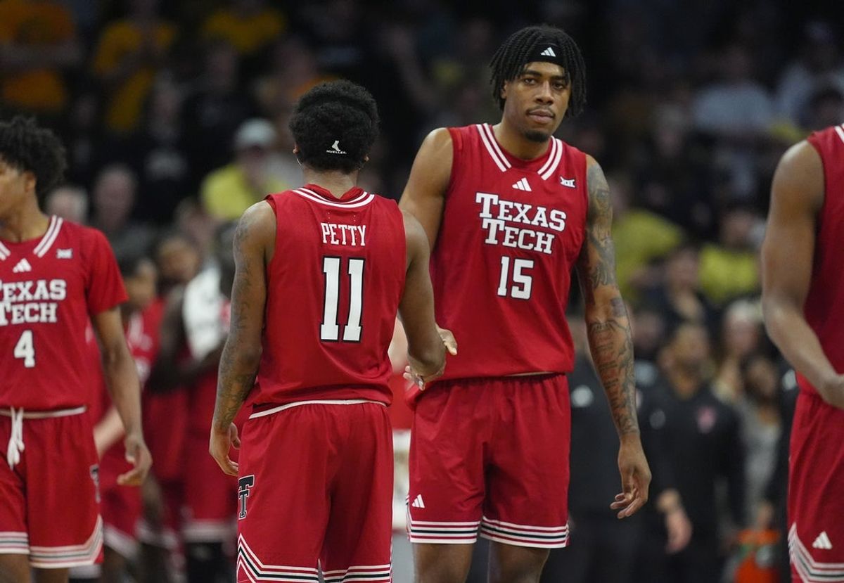 Jan 10, 2026; Boulder, Colorado, USA; Texas Tech Red Raiders guard Jaylen Petty (11) and forward JT Toppin (15) during the second half against the Colorado Buffaloes at CU Events Center. Mandatory Credit: Ron Chenoy-Imagn Images
