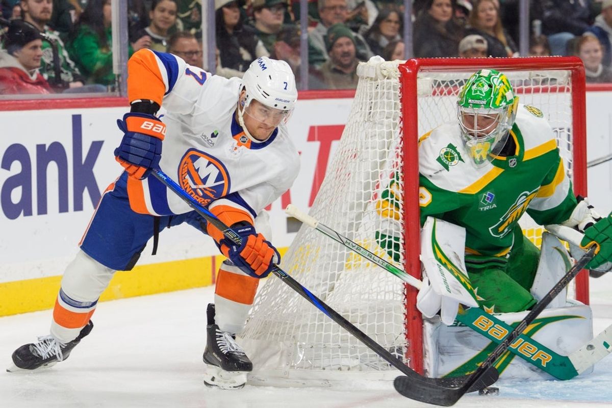 Jan 10, 2026; Saint Paul, Minnesota, USA; New York Islanders right wing Maxim Tsyplakov (7) tries a wrap around shot on Minnesota Wild goaltender Filip Gustavsson (32) in the third period at Grand Casino Arena. Mandatory Credit: Matt Blewett-Imagn Images