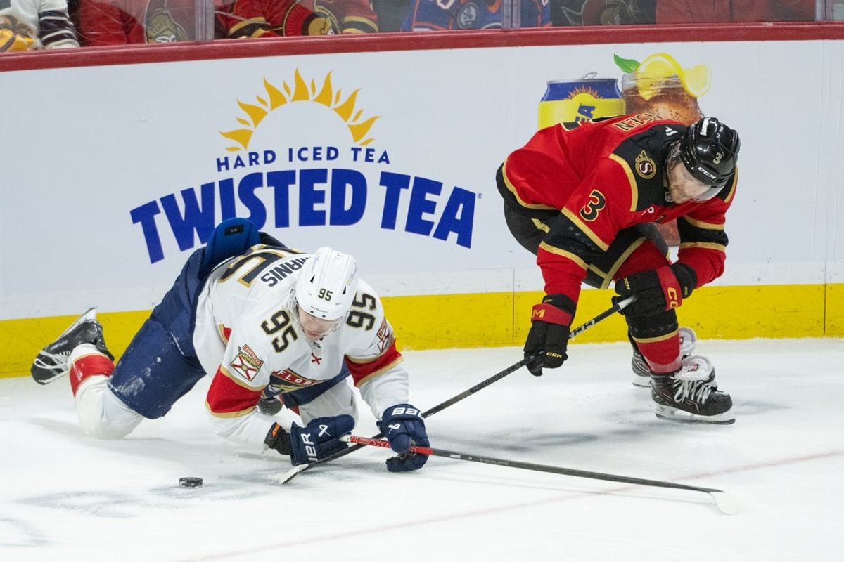 Jan 10, 2026; Ottawa, Ontario, CAN; Florida Panthers left wing Sandis Vilmanis (95) battles with Ottawa Senators defenseman Nick Jensen (3) after being taken down in the third period at the Canadian Tire Centre. Mandatory Credit: Marc DesRosiers-IMAGN Images