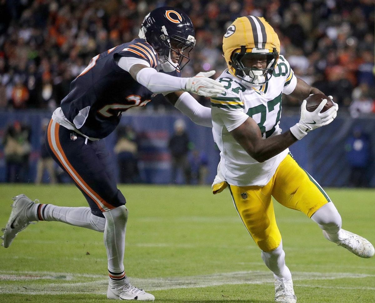 Green Bay Packers wide receiver Romeo Doubs (87) catches a pass in front of Chicago Bears cornerback Nahshon Wright (26) during their wild-card playoff football game Saturday, January 10, 2026, at Soldier Field in Chicago, Illinois. 
Wm. Glasheen /USA TODAY NETWORK-Wisconsin.