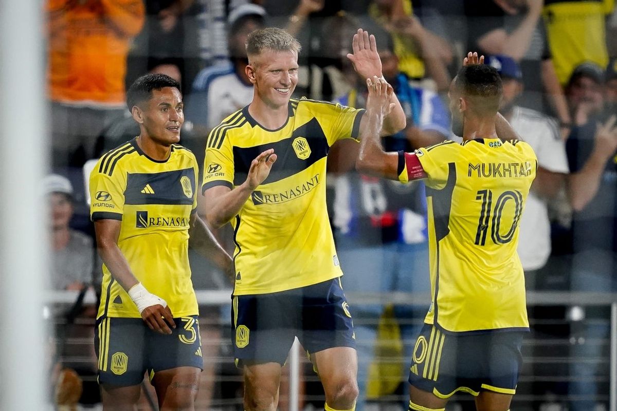Nashville SC forward Sam Surridge (9) celebrates his third goal against Philadelphia Union during the second half of a U.S. Open Cup semifinal soccer match at Geodis Park in Nashville, Tenn., Tuesday, Sept. 16, 2025.