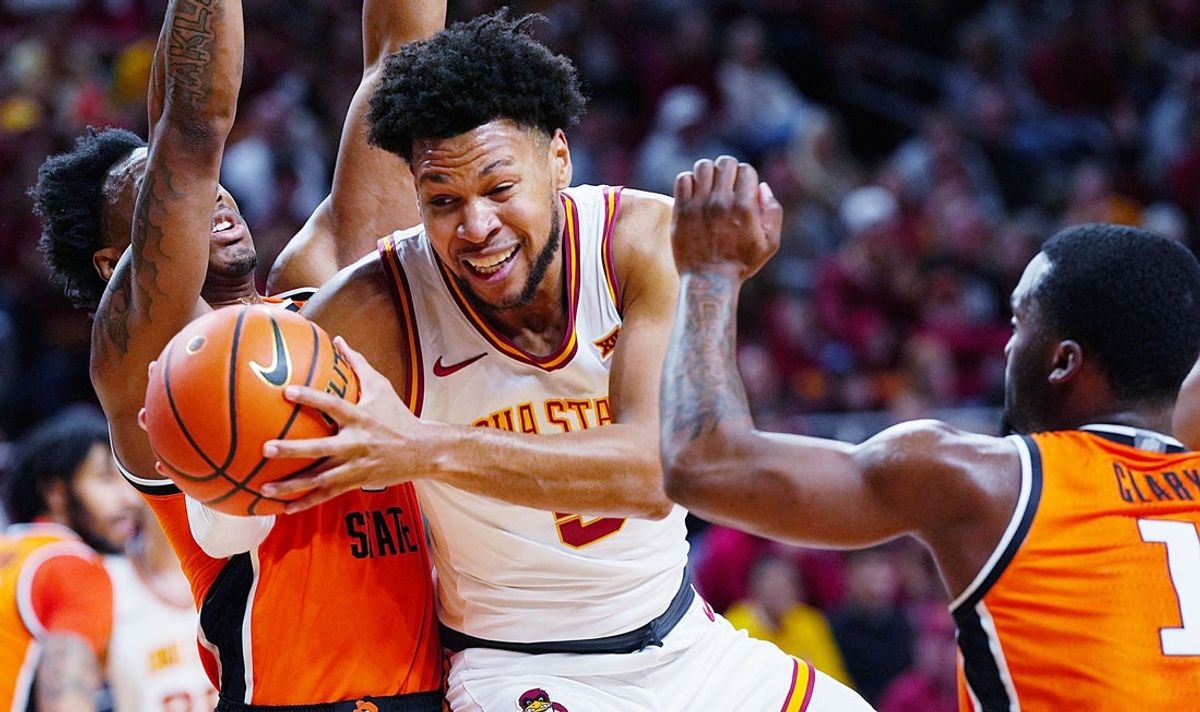 Iowa State Cyclones forward Joshua Jefferson (5) drives to the basket between Oklahoma State Cowboys guard Anthony Roy (9) and Oklahoma State Cowboys guard Kanye Clary (1) during the first half in the Big-12 men’s basketball on Jan. 10, 2026, at Hilton Coliseum in Ames, Iowa.
