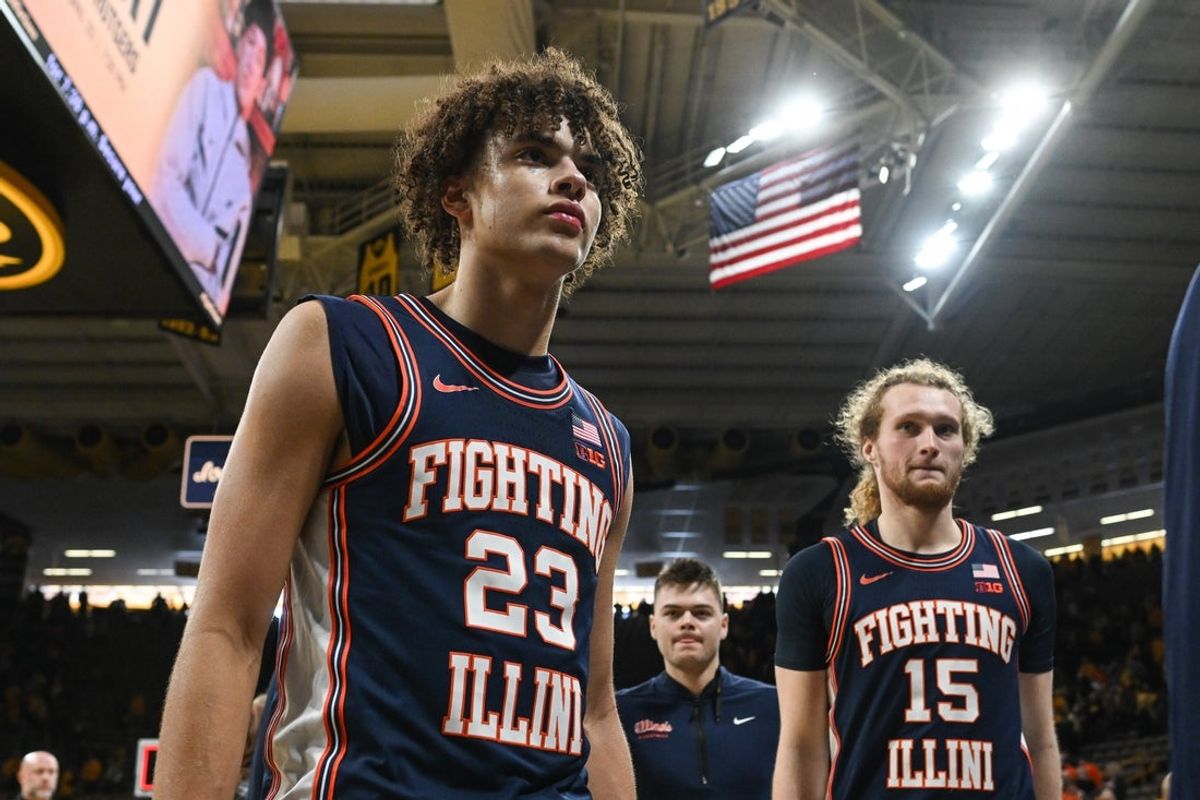 Jan 11, 2026; Iowa City, Iowa, USA; Illinois Fighting Illini guard Keaton Wagler (23) and forward Jake Davis (15) walk off the court after the game against the Iowa Hawkeyes at Carver-Hawkeye Arena. Mandatory Credit: Jeffrey Becker-Imagn Images