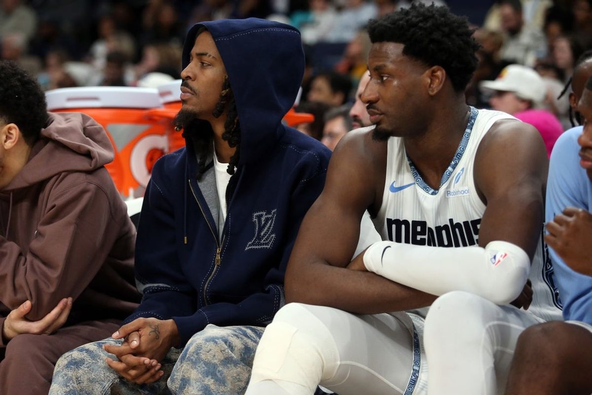 Jan 11, 2026; Memphis, Tennessee, USA; Memphis Grizzlies guard Ja Morant (left) and forward/center Jaren Jackson Jr. (right) looks on during the second quarter against the Brooklyn Nets at FedExForum. Mandatory Credit: Petre Thomas-Imagn Images