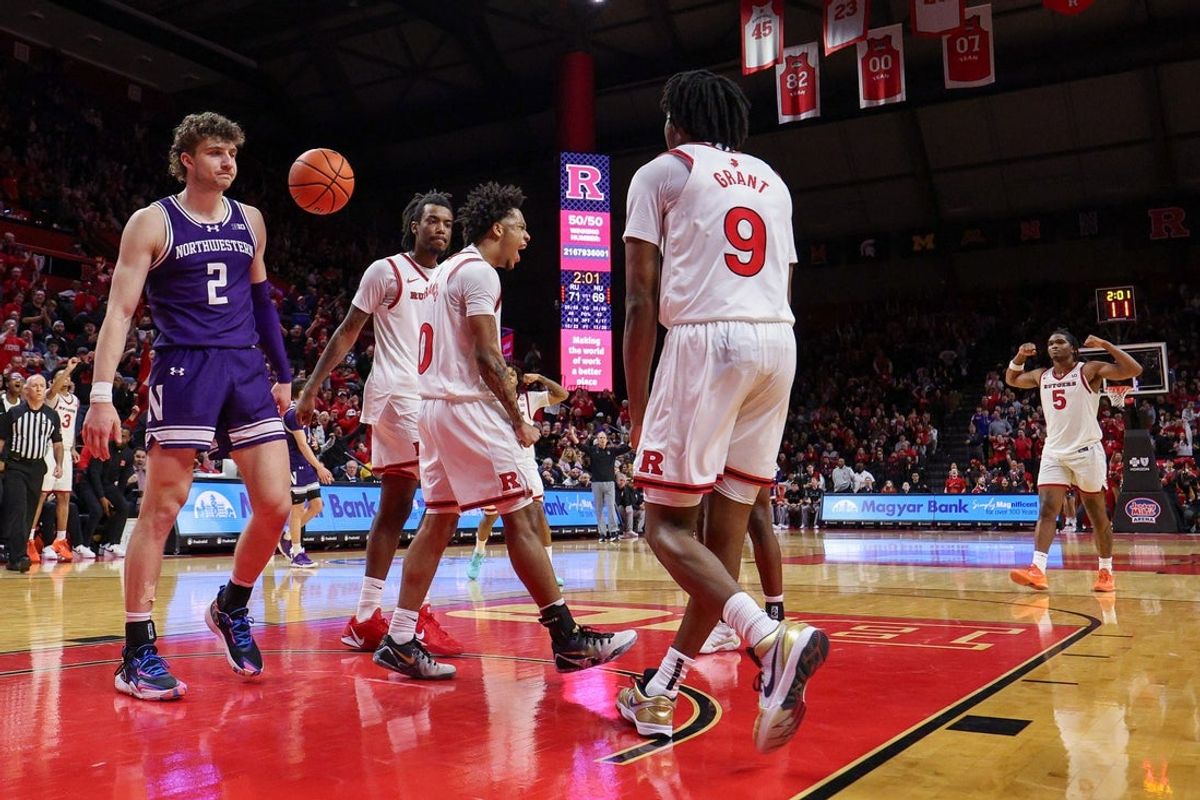 Jan 11, 2026; Piscataway, New Jersey, USA; Rutgers Scarlet Knights guard Tariq Francis (0) reacts after a basket against the Northwestern Wildcats during overtime at Jersey Mike's Arena. Mandatory Credit: Vincent Carchietta-Imagn Images
