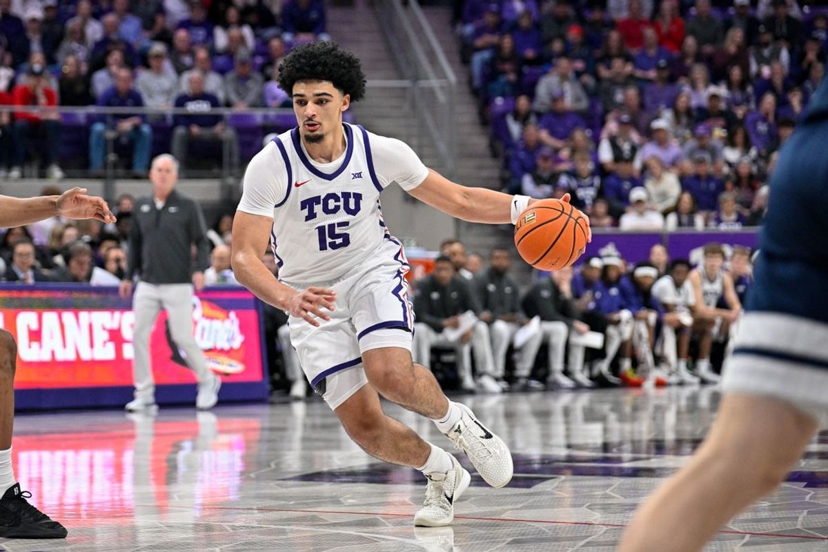 Jan 10, 2026; Fort Worth, Texas, USA; TCU Horned Frogs forward David Punch (15) brings the ball up court during the game between the Horned Frogs and the Wildcats at Ed and Rae Schollmaier Arena. Mandatory Credit: Jerome Miron-Imagn Images