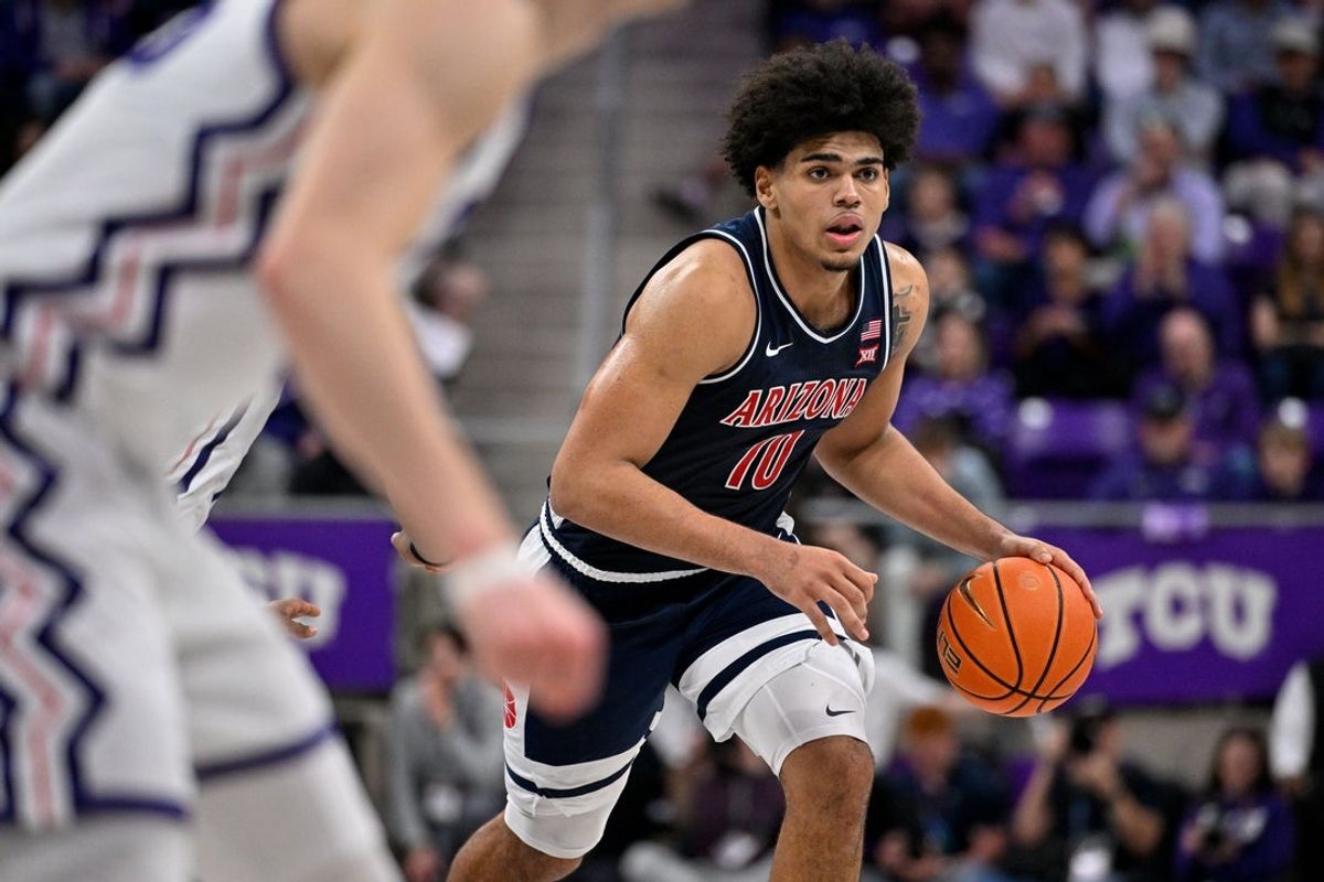 Jan 10, 2026; Fort Worth, Texas, USA; Arizona Wildcats forward Koa Peat (10) brings the ball up court during the game between the Horned Frogs and the Wildcats at Ed and Rae Schollmaier Arena. Mandatory Credit: Jerome Miron-Imagn Images