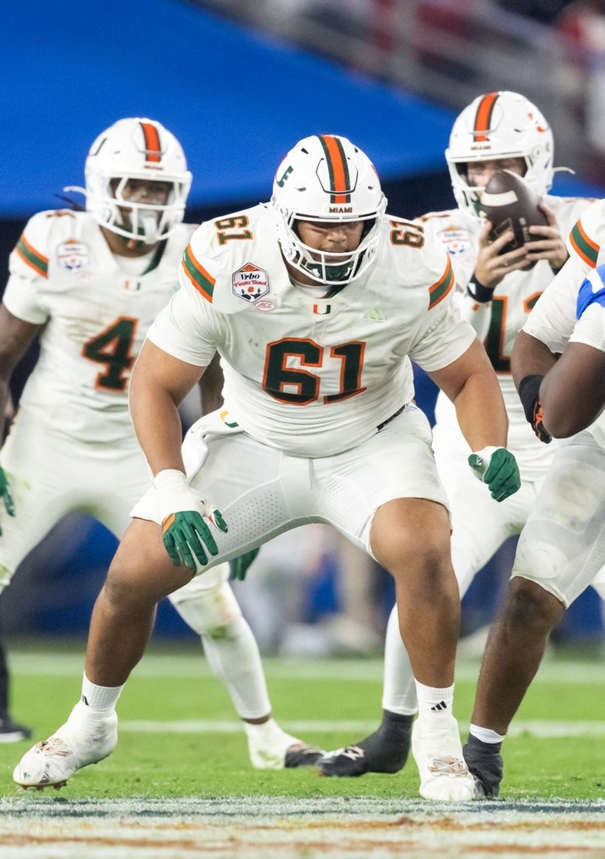 Jan 8, 2026; Glendale, AZ, USA; Miami Hurricanes offensive lineman Francis Mauigoa (61) against the Mississippi Rebels during the 2026 Fiesta Bowl and semifinal game of the College Football Playoff at State Farm Stadium. Mandatory Credit: Mark J. Rebilas-Imagn Images