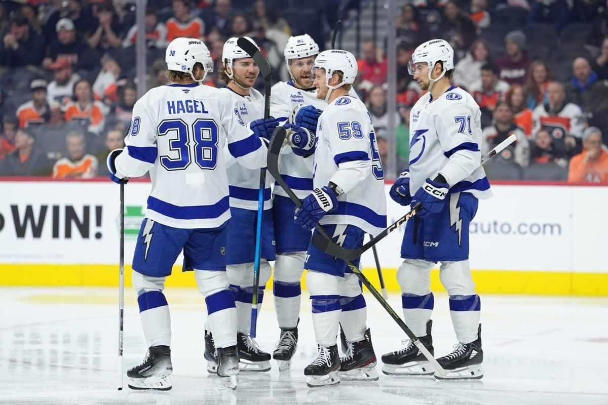 Jan 12, 2026; Philadelphia, Pennsylvania, USA; Tampa Bay Lightning center Jake Guentzel (59) celebrates with teammates after scoring a goal against the Philadelphia Flyers in the second period at Xfinity Mobile Arena. Mandatory Credit: Kyle Ross-Imagn Images