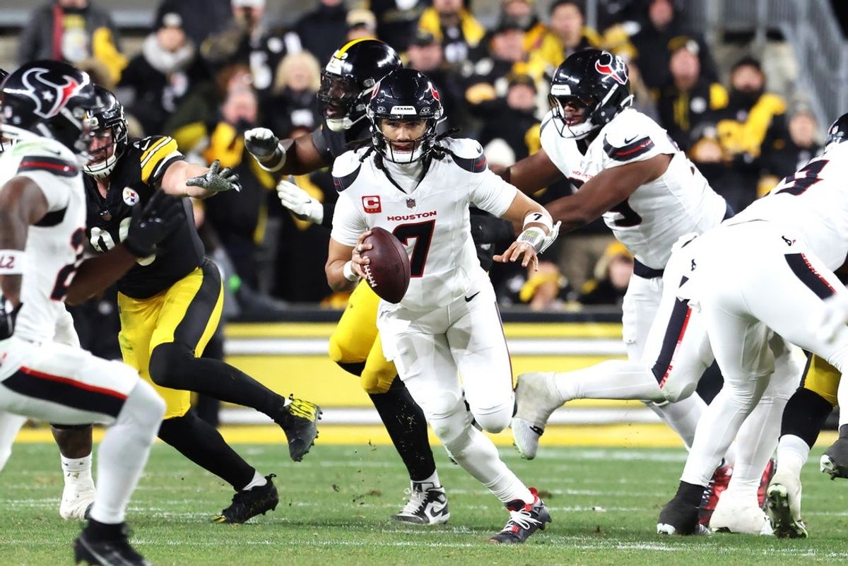 Jan 12, 2026; Pittsburgh, PA, USA; Houston Texans quarterback C.J. Stroud (7) scrambles during the first half of an AFC Wild Card Round game against the Pittsburgh Steelers at Acrisure Stadium. Mandatory Credit: Charles LeClaire-Imagn Images