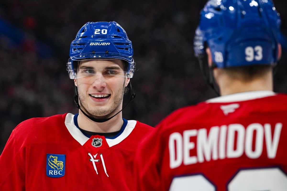 Jan 12, 2026; Montreal, Quebec, CAN; Montreal Canadiens left wing Juraj Slafkovsky (20) looks towards right wing Ivan Demidov (93) against the Vancouver Canucks during the third period at Bell Centre. Mandatory Credit: David Kirouac-Imagn Images