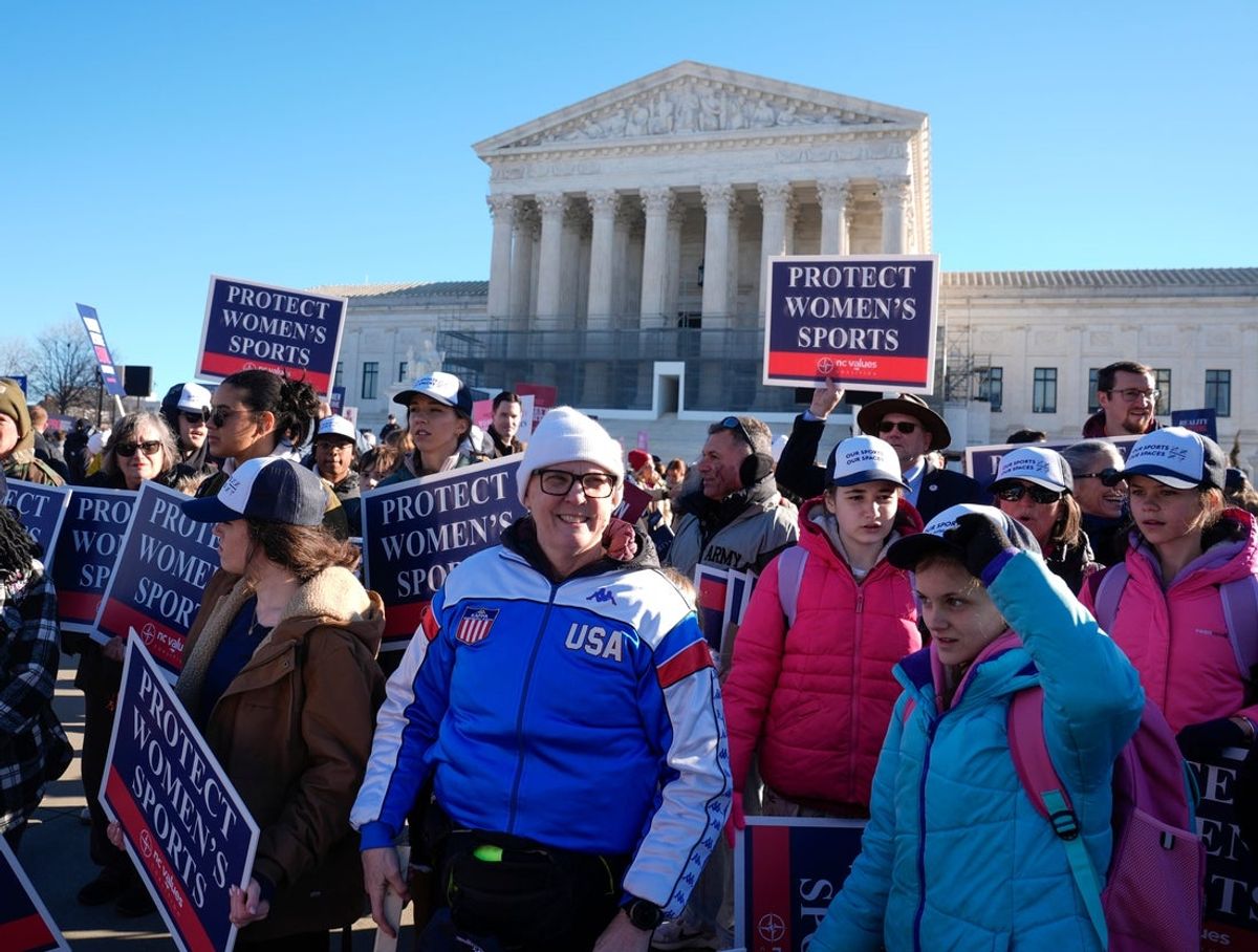 Demonstrators rally outside of the Supreme Court as the justices hear oral arguments in two cases related to transgender athlete participation in sports in Washington, DC, on Jan. 13, 2026. The cases, Little v. Hecox and West Virginia v. B.P.J., seek to decide whether laws that limit participation to women and girls based on sex violate the equal protection clause of the 14th Amendment.