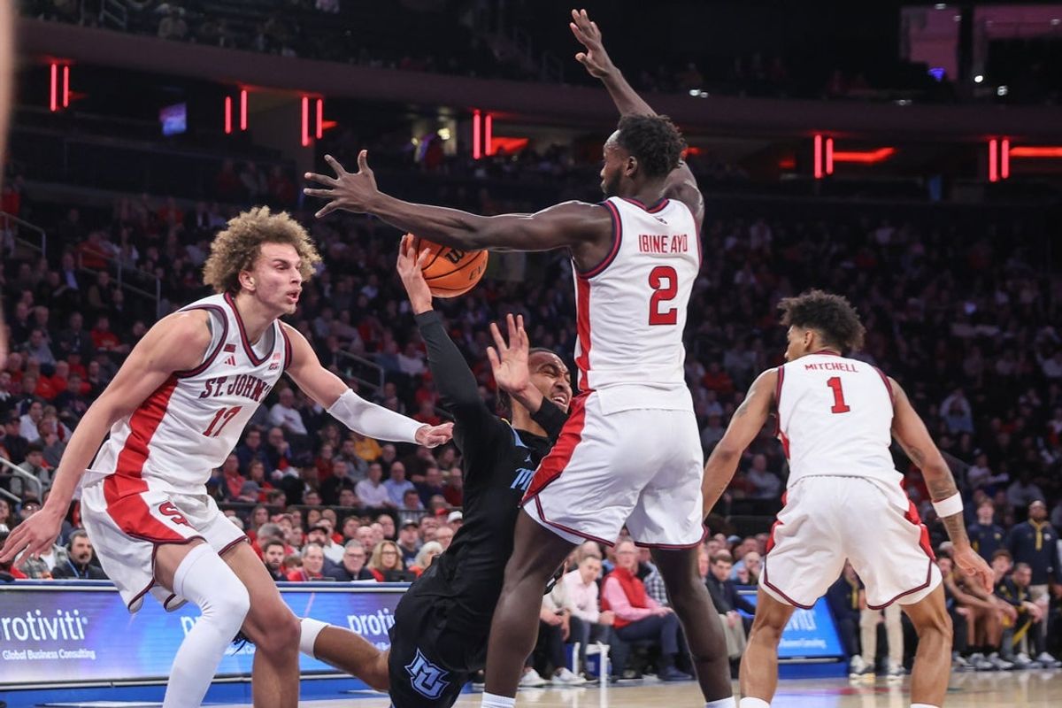 Jan 13, 2026; New York, New York, USA;  Marquette Golden Eagles guard Adrien Stevens (10) runs into St. John's Red Storm forward Sadiku Ibine Ayo (2) in the first half at Madison Square Garden Mandatory Credit: Wendell Cruz-Imagn Images