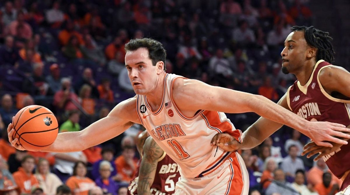 Clemson Tigers forward Nick Davidson (11) drives past Boston College Eagles guard Aidan Shaw (23) Tuesday, Jan. 13, 2026, during the NCAA men’s basketball game at Littlejohn Coliseum in Clemson, South Carolina.
