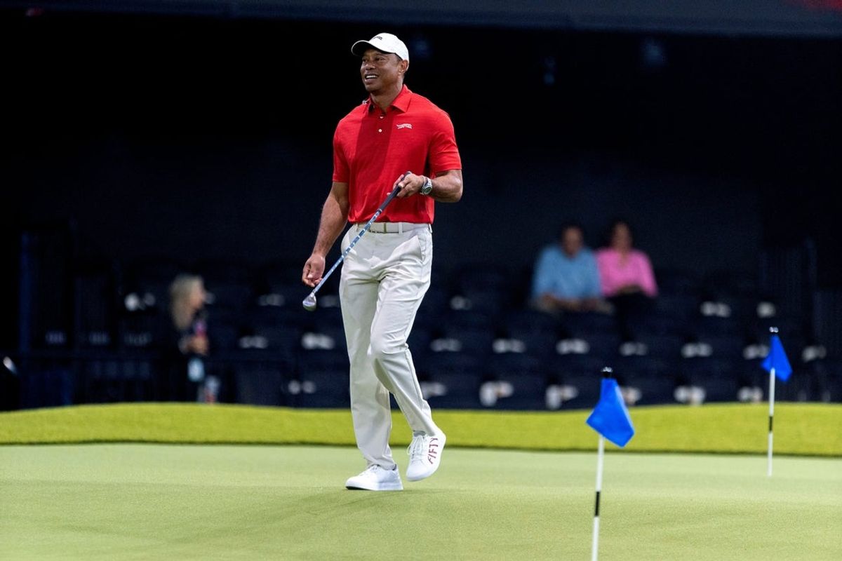 Tiger Woods of Jupiter Links walks across the green before a TGL match against New York Golf Club at SoFi Center on January 13, 2026, in Palm Beach Gardens, Florida.