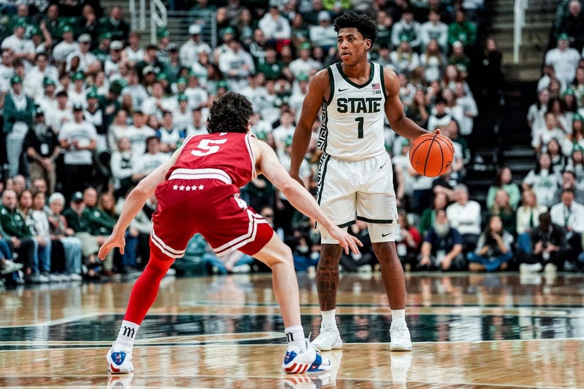 Michigan State guard Jeremy Fears Jr. (1) looks to pass the ball against Indiana guard Conor Enright (5) during the first half at Breslin Center in East Lansing on Tuesday, Jan. 13, 2026.