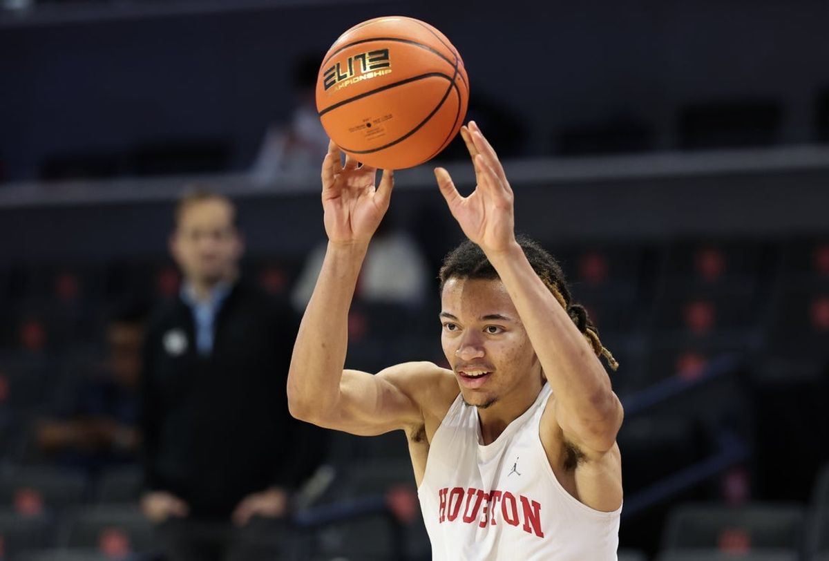 Jan 13, 2026; Houston, Texas, USA; Houston Cougars guard Kingston Flemings (4) warms up before playing against the West Virginia Mountaineers at Fertitta Center. Mandatory Credit: Thomas Shea-Imagn Images
