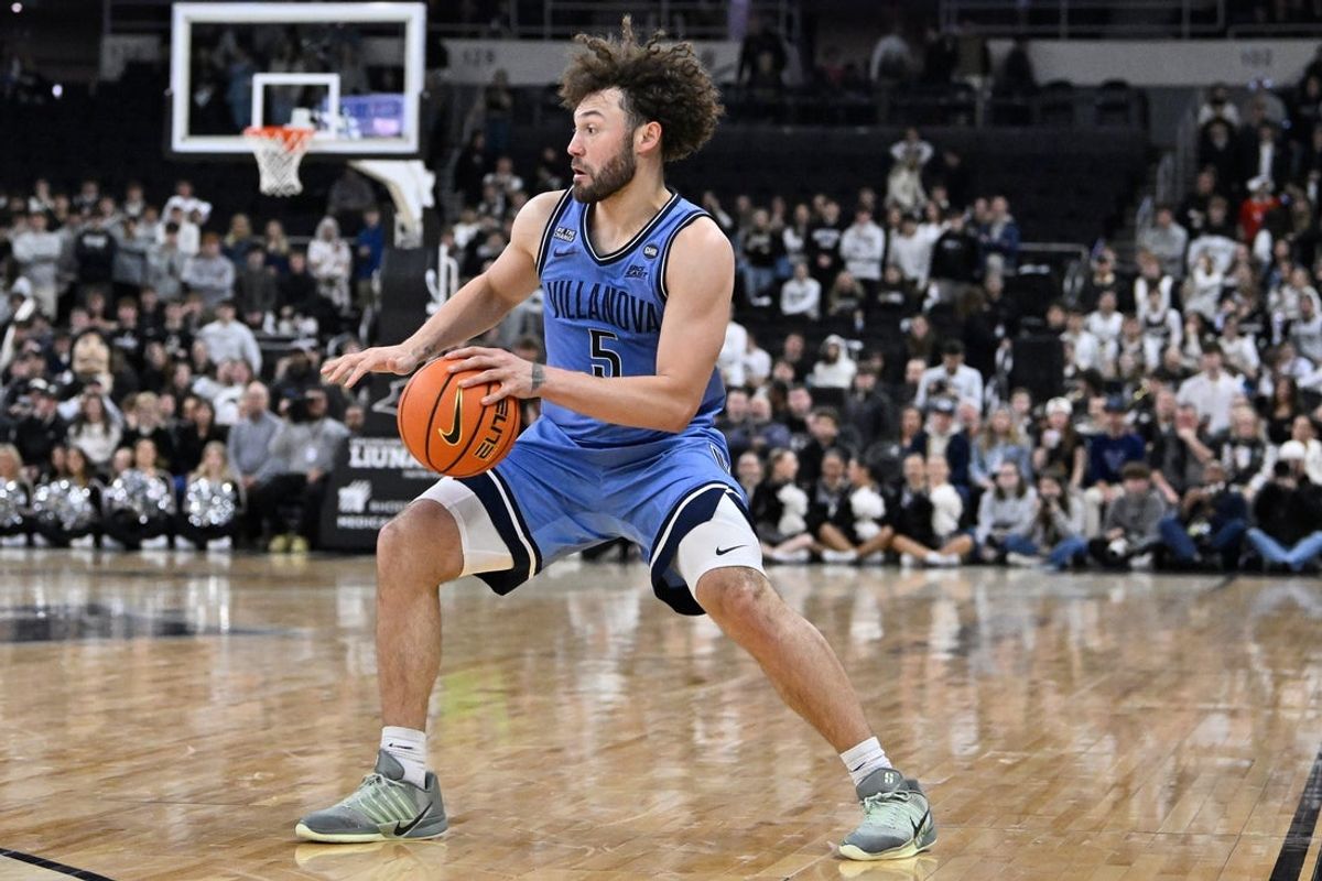 Jan 13, 2026; Providence, Rhode Island, USA; Villanova Wildcats guard Devin Askew (5) drives the ball to the basket during the second half against the Providence Friars at Amica Mutual Pavilion. Mandatory Credit: Eric Canha-Imagn Images