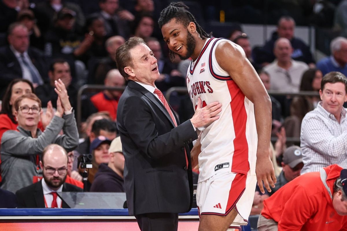Jan 13, 2026; New York, New York, USA;  St. John's Red Storm head coach Rick Pitino greets forward Zuby Ejiofor (24) after substituting him out of the game in the second half against the Marquette Golden Eagles at Madison Square Garden Mandatory Credit: Wendell Cruz-Imagn Images