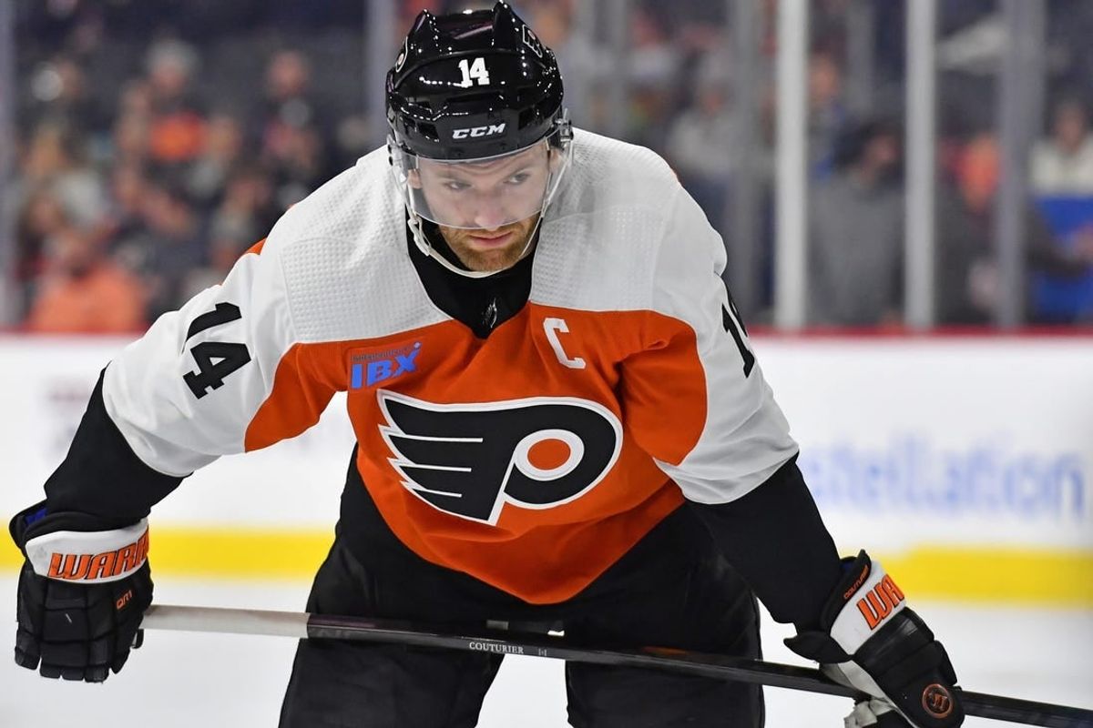 Feb 27, 2024; Philadelphia, Pennsylvania, USA; Philadelphia Flyers center Sean Couturier (14) against the Tampa Bay Lightning at Wells Fargo Center.
