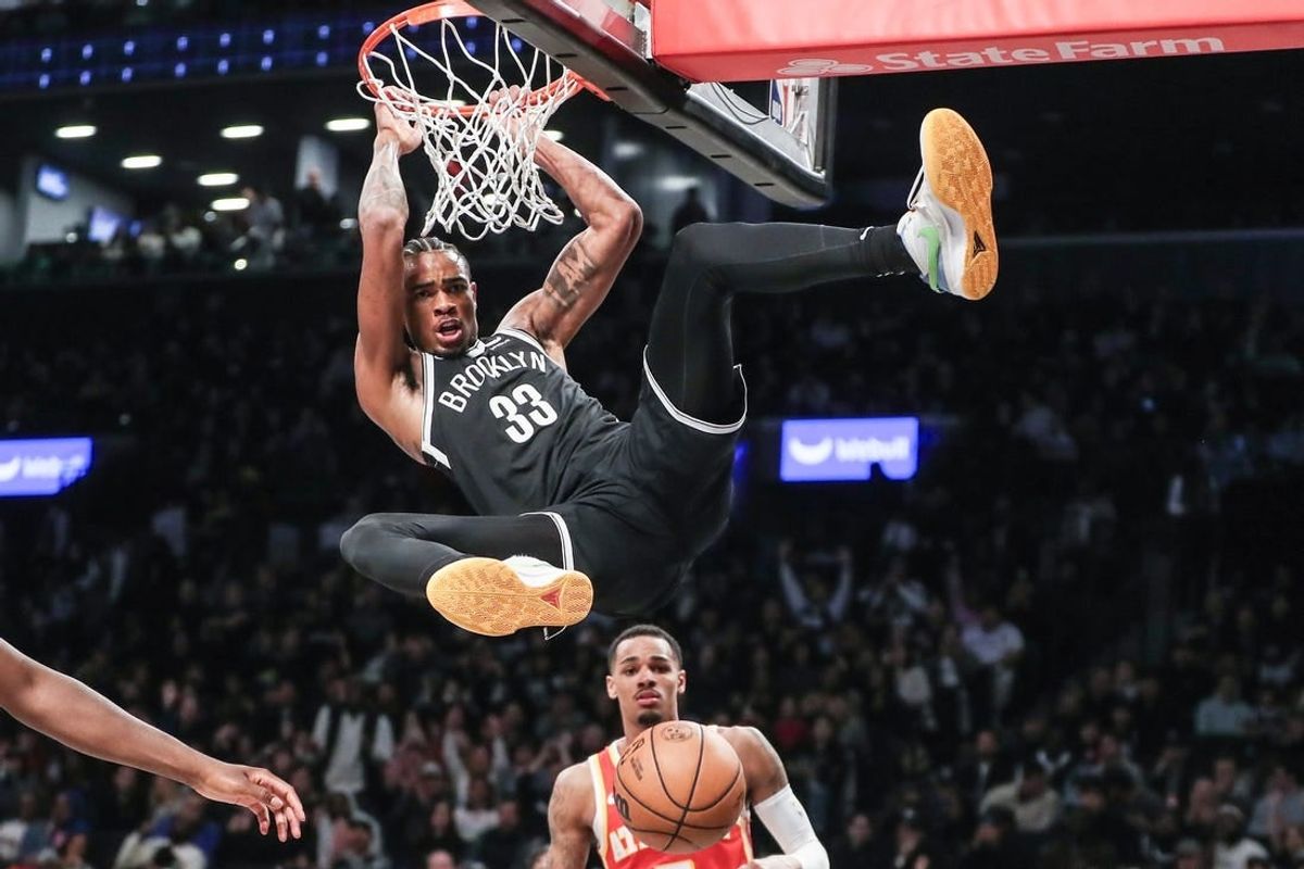 Mar 2, 2024; Brooklyn, New York, USA;  Brooklyn Nets center Nic Claxton (33) dunks in the fourth quarter against the Atlanta Hawks at Barclays Center.