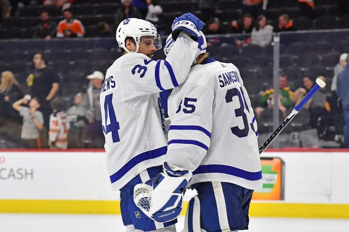 Mar 14, 2024; Philadelphia, Pennsylvania, USA; Toronto Maple Leafs center Auston Matthews (34) and goaltender Ilya Samsonov (35) celebrate win against the Philadelphia Flyers  at Wells Fargo Center.