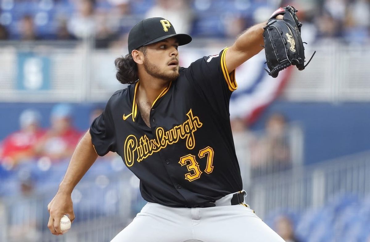 Mar 30, 2024; Miami, Florida, USA; Pittsburgh Pirates starting pitcher Jared Jones (37) pitches against the Miami Marlins in the first inning at loanDepot Park.