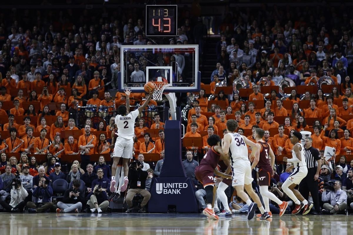 Jan 17, 2024; Charlottesville, Virginia, USA; Virginia Cavaliers guard Reece Beekman (2) shoots the ball against the Virginia Tech Hokies in the first half at John Paul Jones Arena.