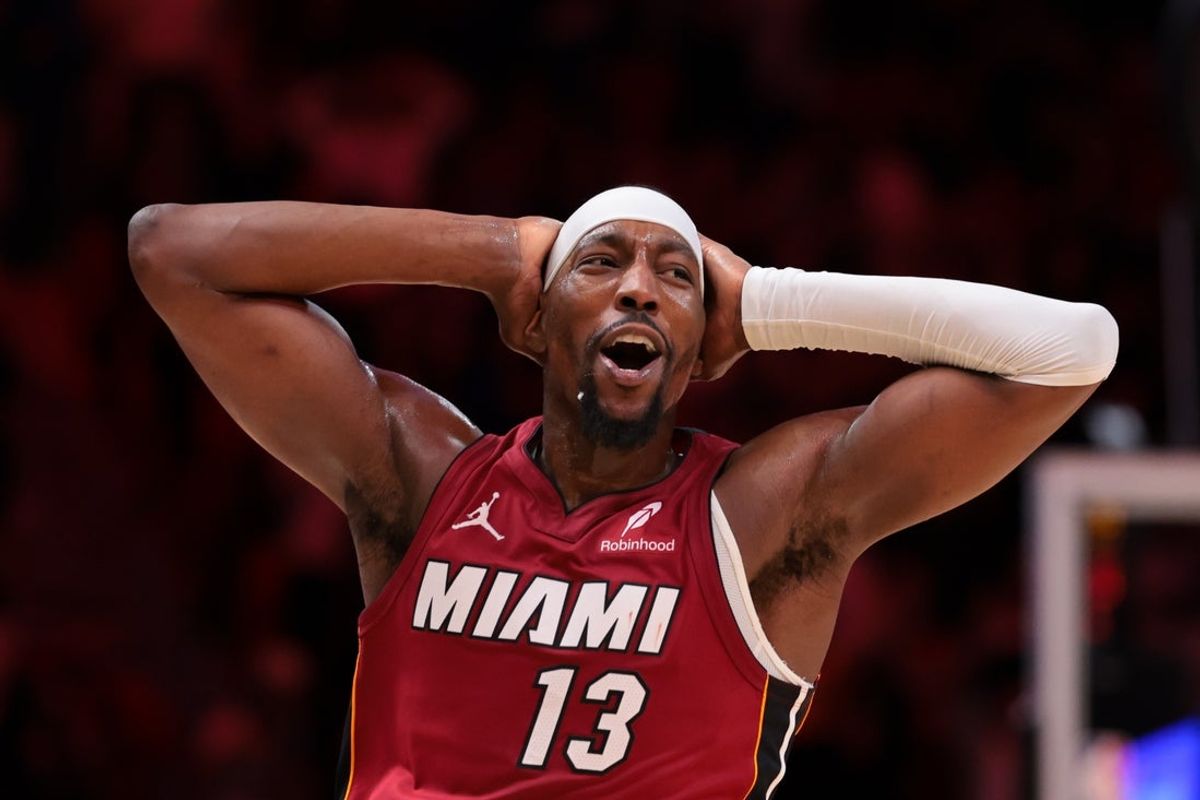 Jan 13, 2026; Miami, Florida, USA; Miami Heat center Bam Adebayo (13) reacts after scoring against the Phoenix Suns during the fourth quarter at Kaseya Center. Mandatory Credit: Sam Navarro-Imagn Images