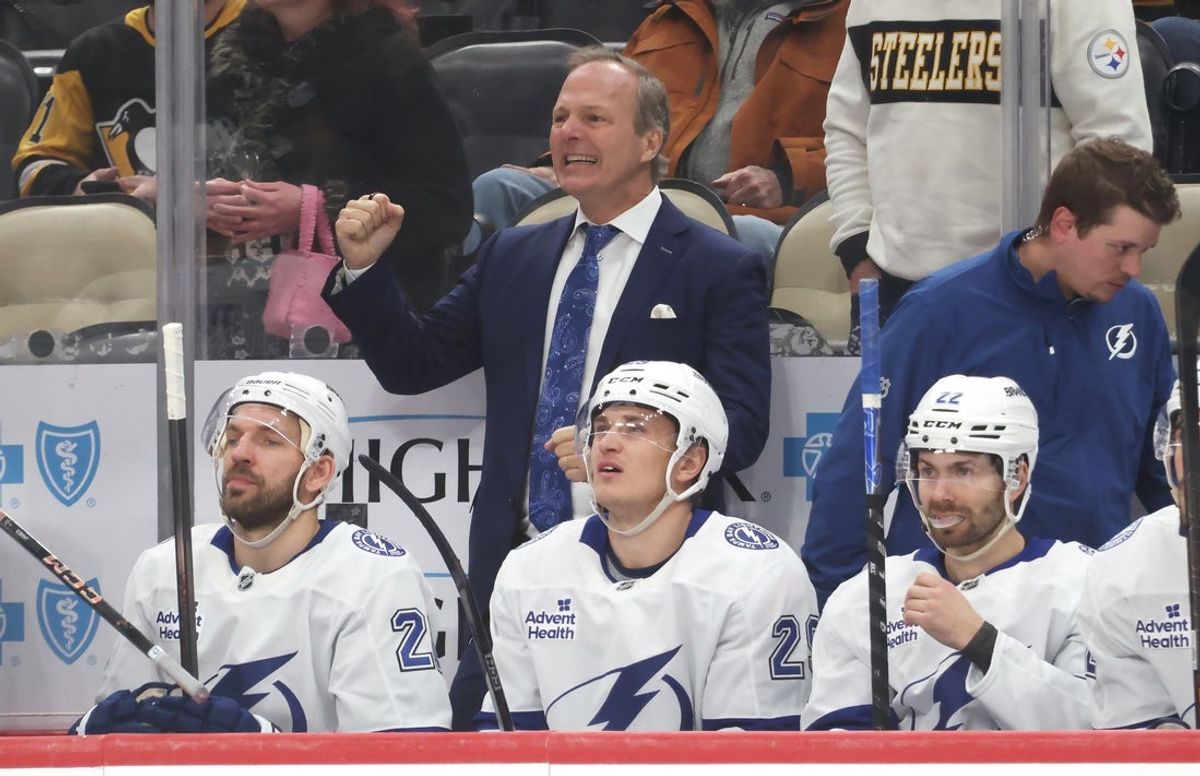Jan 13, 2026; Pittsburgh, Pennsylvania, USA;  Tampa Bay Lightning head coach Jon Cooper (top) reacts during the third period against the Pittsburgh Penguins at PPG Paints Arena. Mandatory Credit: Charles LeClaire-Imagn Images