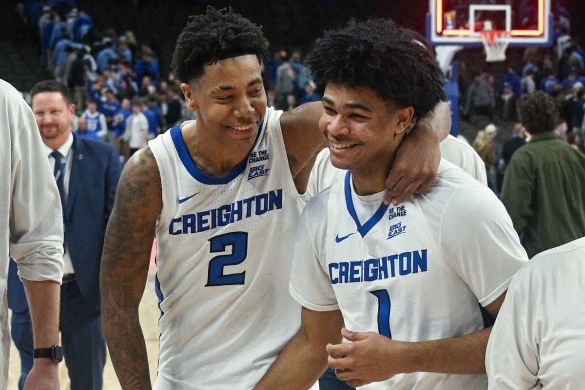 Jan 13, 2026; Omaha, Nebraska, USA;  Creighton Bluejays guard Austin Swartz (1) and guard Blake Harper (2) celebrate after a win against the Georgetown Hoyas at CHI Health Center Omaha. Mandatory Credit: Steven Branscombe-Imagn Images
