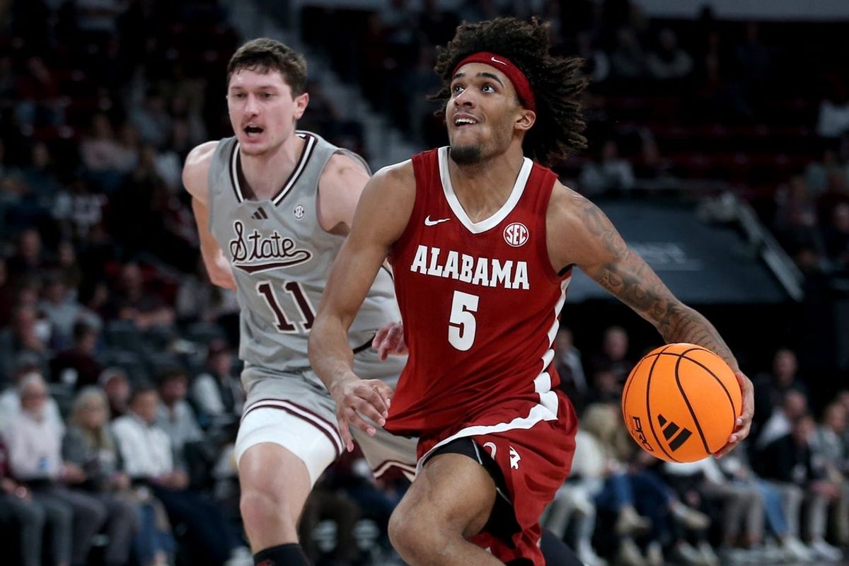 Jan 13, 2026; Starkville, Mississippi, USA; Alabama Crimson Tide forward Amari Allen (5) drives to the basket during the second half  against the Mississippi State Bulldogs at Humphrey Coliseum. Mandatory Credit: Petre Thomas-Imagn Images