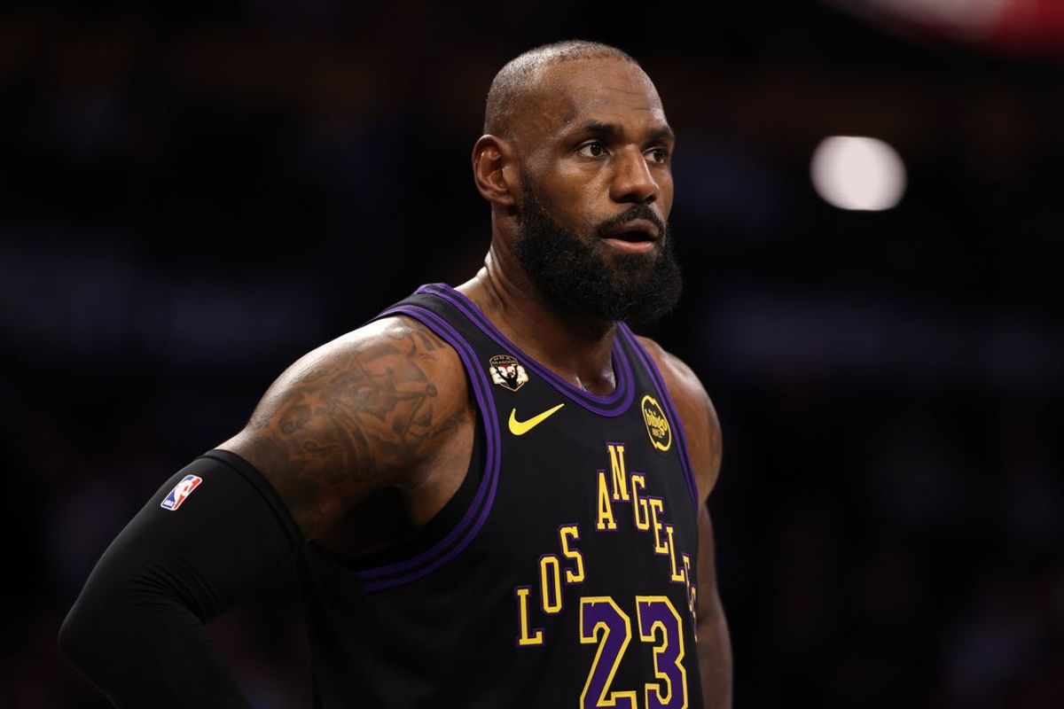 Jan 13, 2026; Los Angeles, California, USA;  Los Angeles Lakers forward LeBron James (23) wears a patch affixed to the upper right chest to celebrate his record-setting 23rd NBA season during the first half against the Atlanta Hawks at Crypto.com Arena. Mandatory Credit: Kiyoshi Mio-Imagn Images