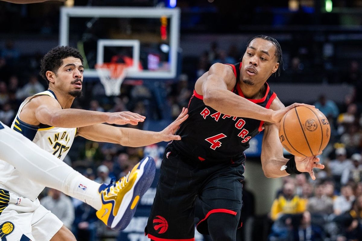 Jan 14, 2026; Indianapolis, Indiana, USA; Toronto Raptors forward/guard Scottie Barnes (4) passes  the ball while  Indiana Pacers guard Ben Sheppard (26) defends in the first half at Gainbridge Fieldhouse. Mandatory Credit: Trevor Ruszkowski-Imagn Images