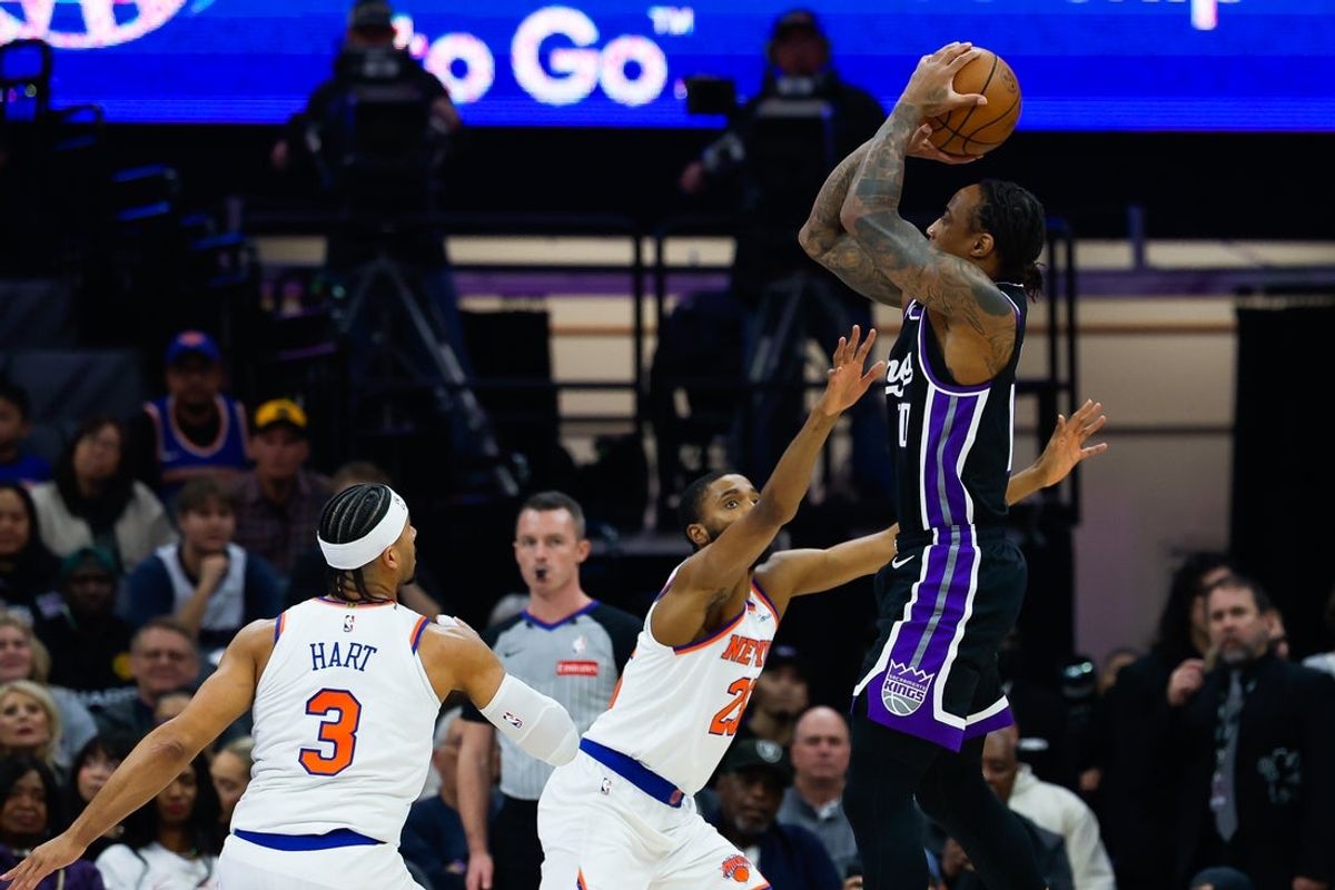 Jan 14, 2026; Sacramento, California, USA; Sacramento Kings guard DeMar DeRozan (10) shoots the ball against New York Knicks guard Mikal Bridges (25) during the first quarter at Golden 1 Center. Mandatory Credit: Sergio Estrada-Imagn Images