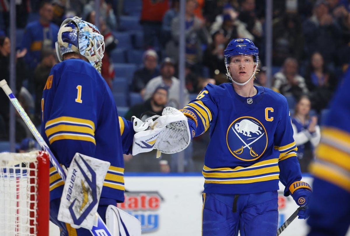 Jan 14, 2026; Buffalo, New York, USA;  Buffalo Sabres goaltender Ukko-Pekka Luukkonen (1) and defenseman Rasmus Dahlin (26) celebrate a win over the Philadelphia Flyers at KeyBank Center. Mandatory Credit: Timothy T. Ludwig-Imagn Images